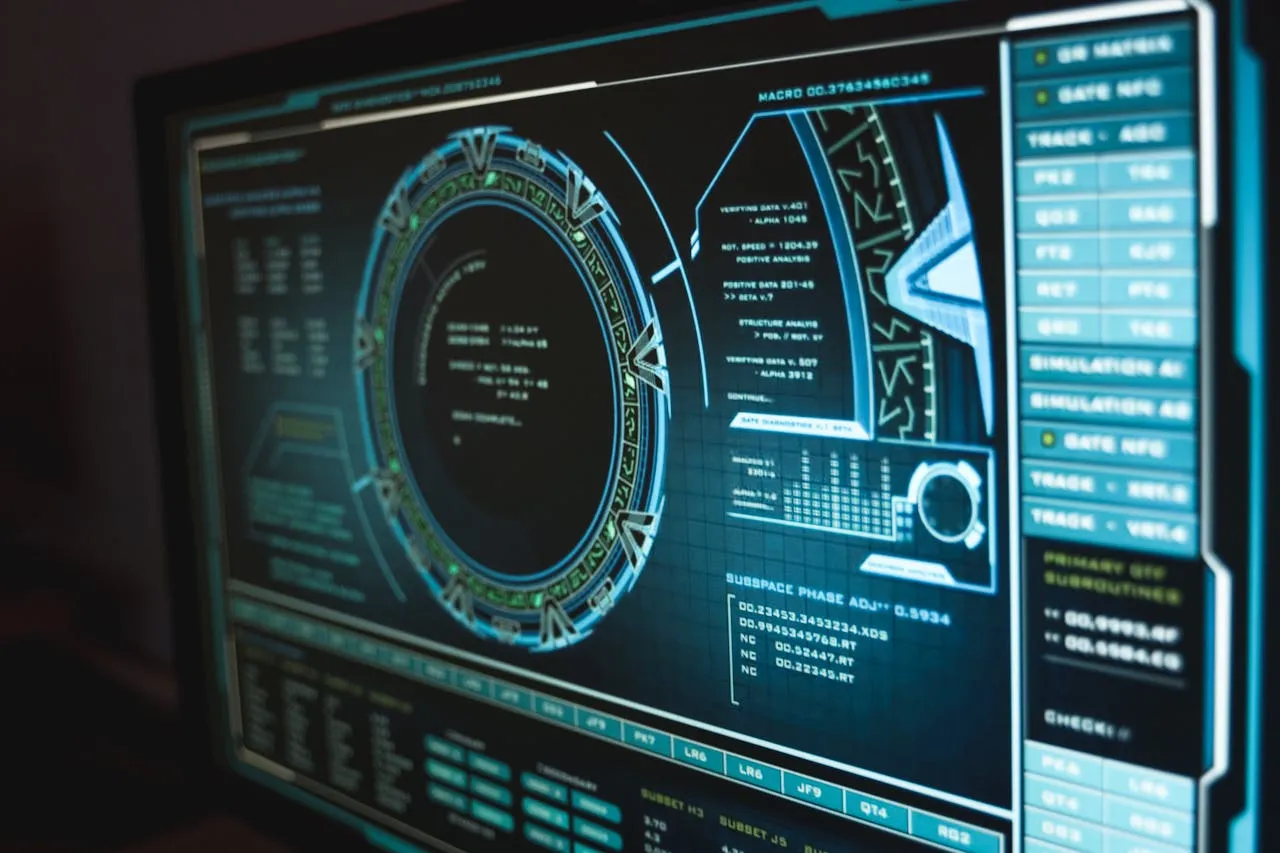 A monitor with programming and sci fi visuals