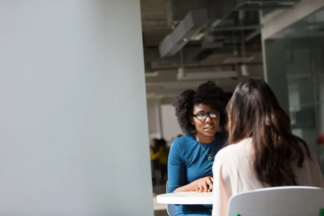 A lady is taking an interview on other lady